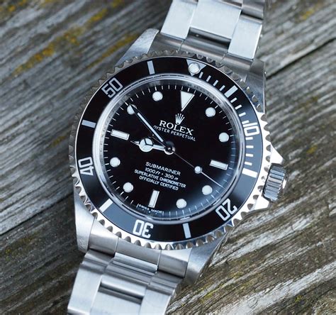 rolex submariner quadrante nero reg 14060 m|rolex 14060m production years.